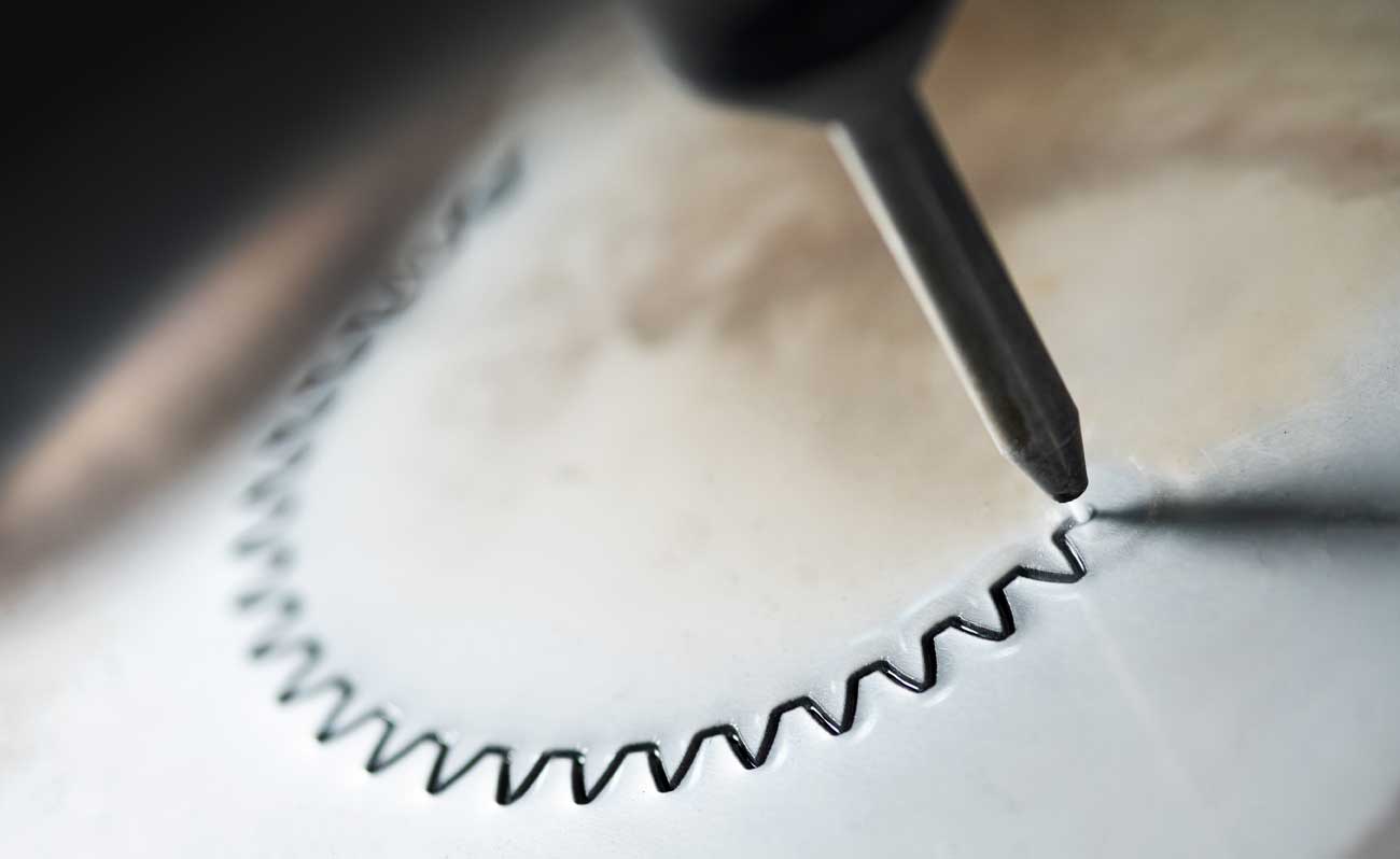 Water jet cutting of stainless steel sheet