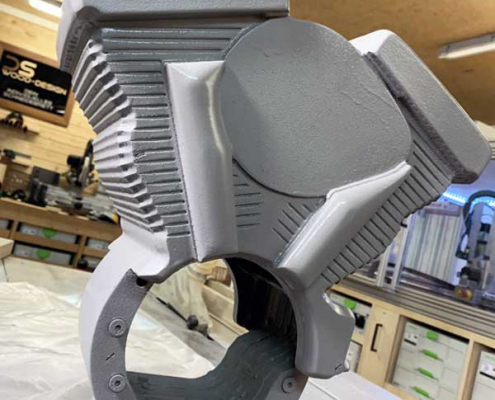 Wooden motorcycle engine painted