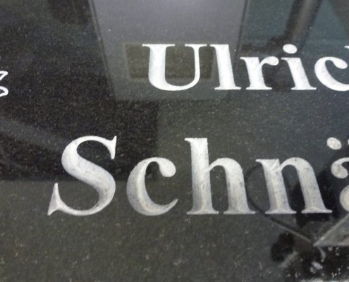 Recessed lettering granite tombstone